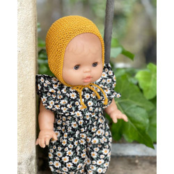 Peto de tela estampado flores y capota mostaza.